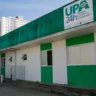 Fachada da UPA Moacyr Scliar, com paredes brancas e verdes, localizada em área urbana.